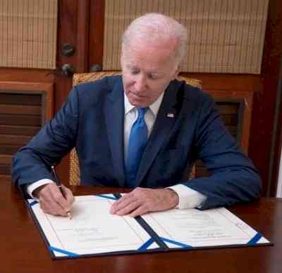 Biden signs stopgap measure to extend govt funding until March