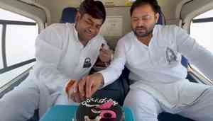 JD-U takes a jibe at Tejashwi Yadav over mid air cake-cutting in helicopter