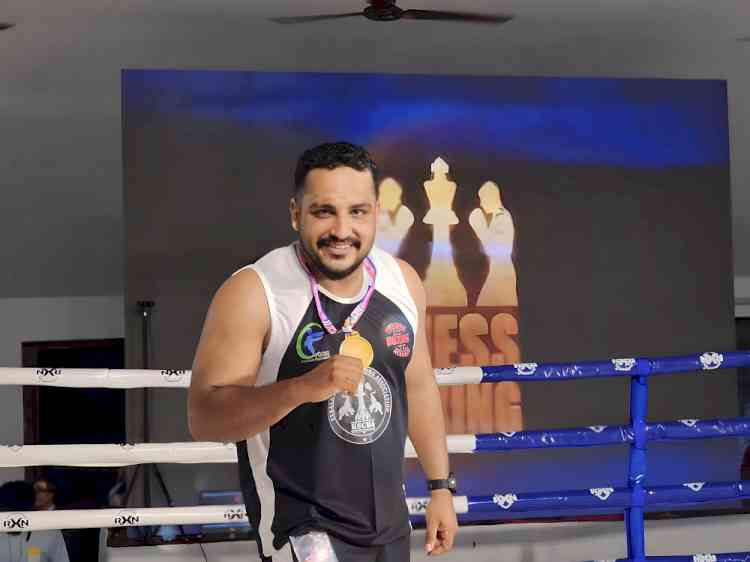 UST employee wins gold medal in chess boxing championship at Kovalam