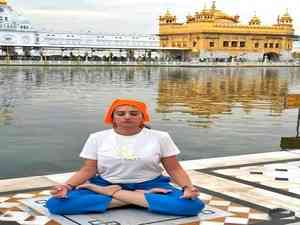SGPC files complaint against Instagram influencer for doing yoga in Golden Temple