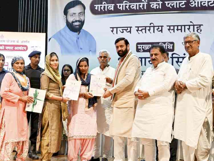 CM Nayab Saini personally gives plot allotment letters to beneficiaries in State-level ceremony held in Rohtak