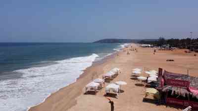 3 women booked for massage on Goa beach