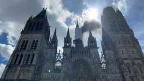 Fire in 11th-century cathedral in France's Rouen contained, damage unclear (Lead)