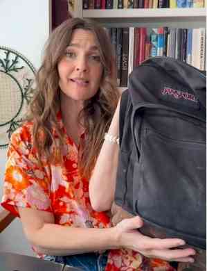 Drew Barrymore reveals what's in her bag as she launches summer travel edition