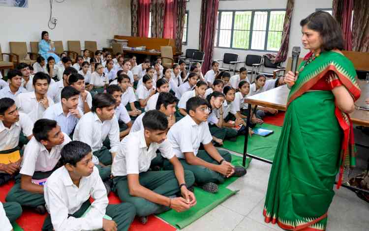 Dr Kitty Mukherjee gives the mantra of 'Do what you love' to the students of MDU Campus School