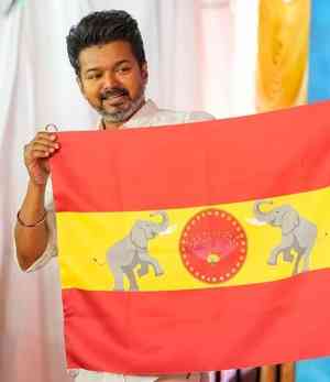 Tamil superstar-turned-politician Vijay unveils party flag