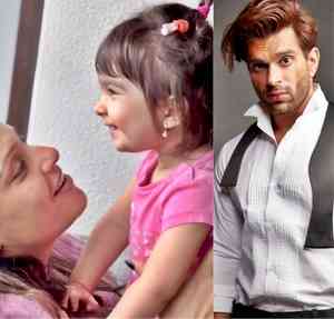 Karan Singh Grover turns in-house paparazzi for Bipasha & Devi