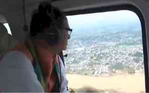 Union Minister Chouhan undertakes aerial survey of flood-hit Khammam, meets farmers