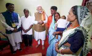 PM Modi interacts with beneficiaries of PMAY-U in Bhubaneswar