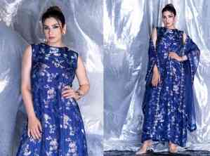 Raveena Tandon experiments with style in blue brocade gown