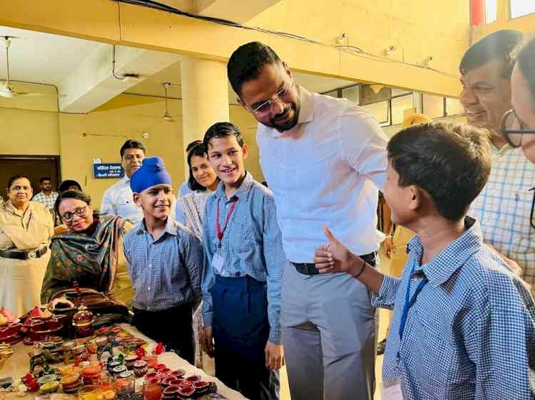 DC inaugurates Diwali items' stall by specially-abled students of government school