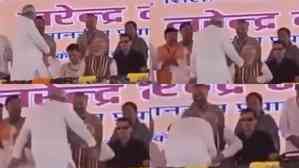 Nitish Kumar tried to touch PM Modi’s feet in Darbhanga