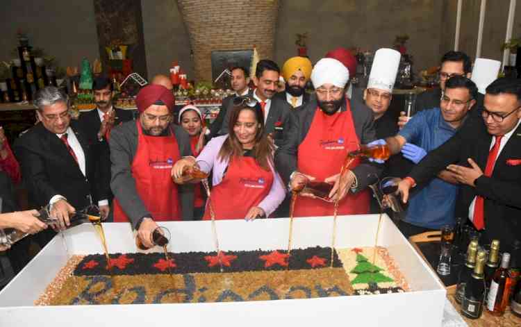 Radisson Blu Hotel MBD Ludhiana Celebrates Christmas Spirit with Tree Lighting and Cake Mixing Ceremony