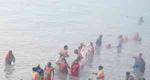 Devotees take dip in rivers in Himachal to mark Makar Sankranti