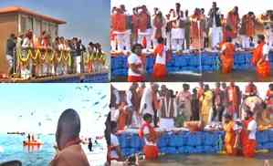 CM Yogi, his ministers take holy dip at Triveni Sangam