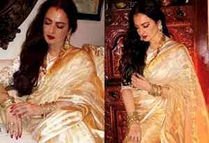 Rekha exudes grace in hand woven gold tissue stripe saree